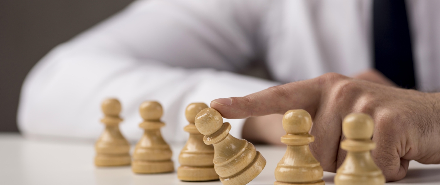 businessman-tumbling-pawn